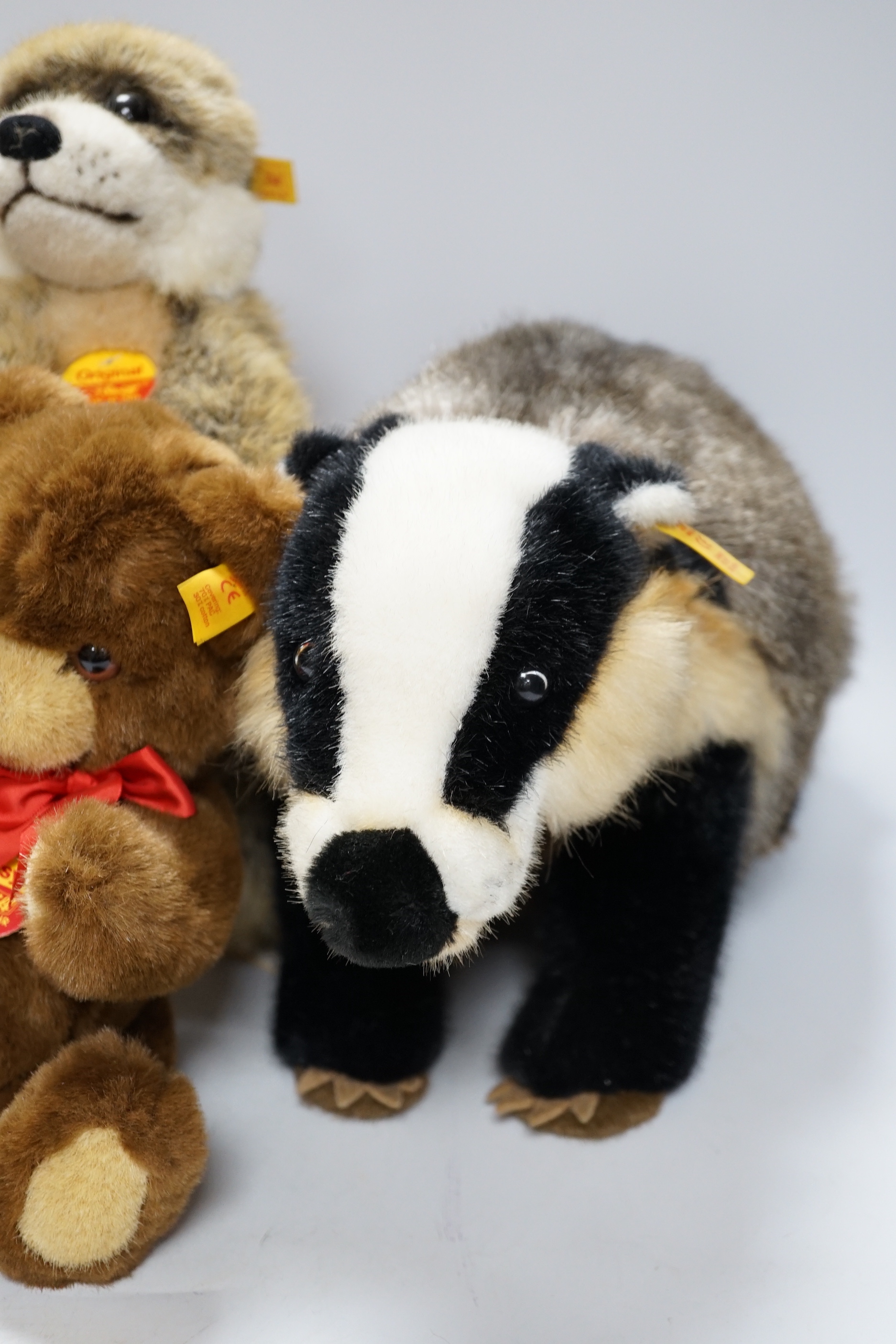 Seven Steiff animals, yellow tag: bear, Sigi badger, Rocky, Muneeb hare, Meerkat and others